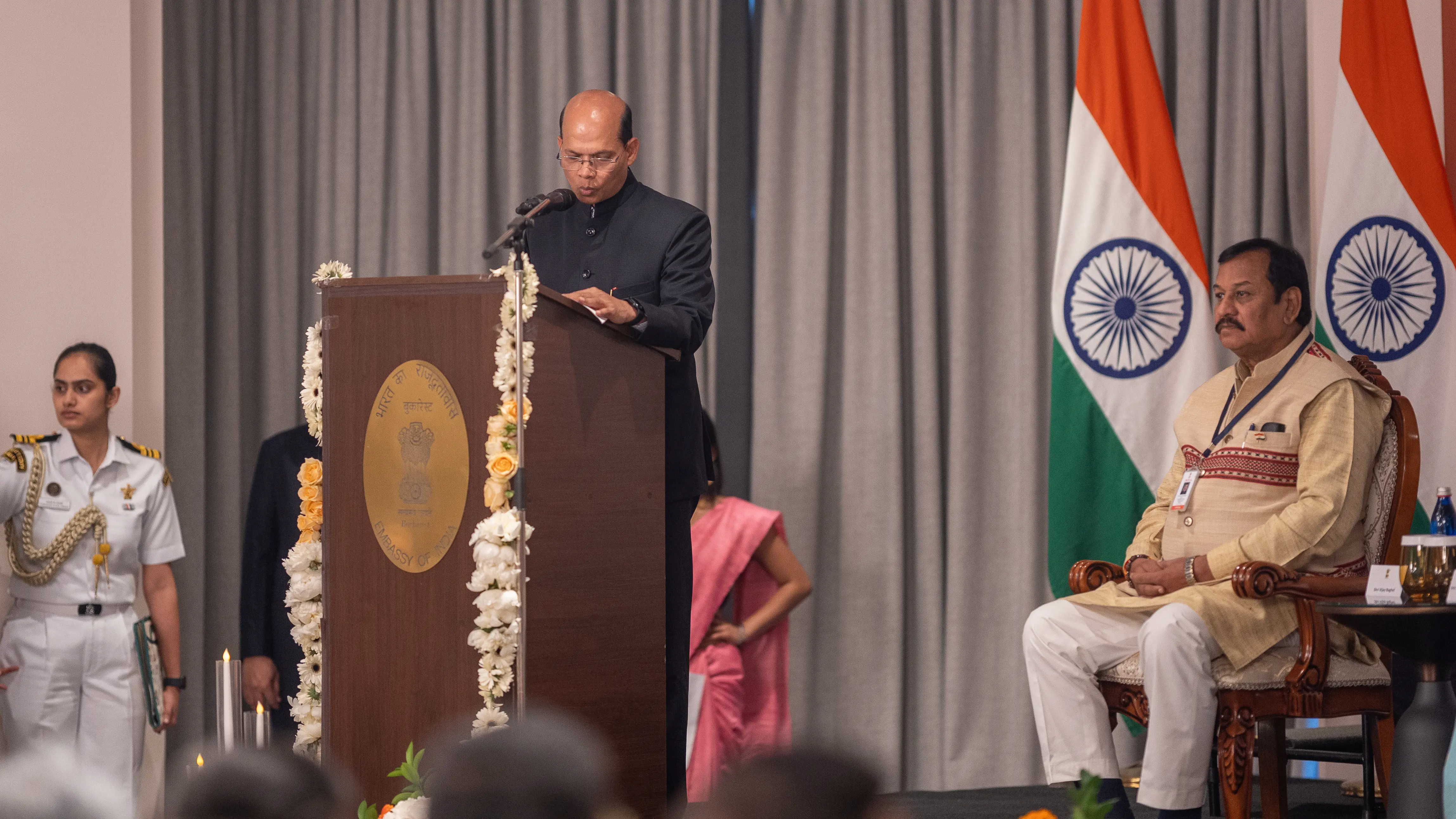Ambassador addressing the podium
